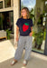 Sweet, playful, and full of charm! This navy short sleeve sweater features the cutest strawberry knit design that instantly adds a fun, fresh touch to your look. The rich navy background makes the strawberries pop, giving it that perfect mix of classic and playful style. Designed with a ribbed neckline, sleeves, and hem, this sweater offers a comfortable and flattering fit that’s easy to wear all day long. 