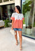 A little texture goes a long way! This short sleeve colorful floral print top by Fate combines soft cotton with airy mesh and delicate appliqué details for a unique, elevated twist on a classic top. Lightweight, breathable, and endlessly versatile, it’s the perfect piece to dress up or down, making it a year-round favorite.
