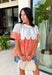 A little texture goes a long way! This short sleeve colorful floral print top by Fate combines soft cotton with airy mesh and delicate appliqué details for a unique, elevated twist on a classic top. Lightweight, breathable, and endlessly versatile, it’s the perfect piece to dress up or down, making it a year-round favorite.