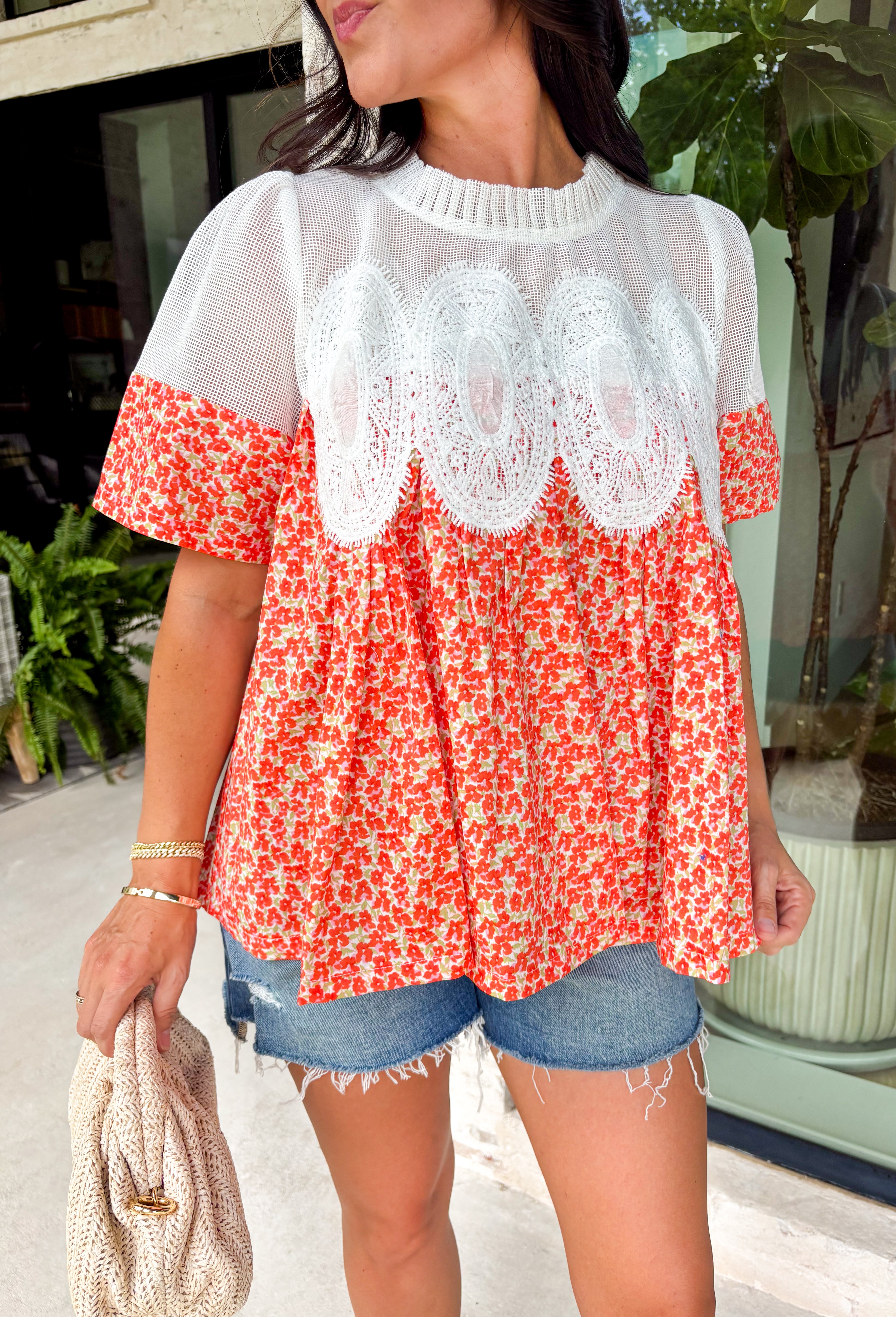 A little texture goes a long way! This short sleeve colorful floral print top by Fate combines soft cotton with airy mesh and delicate appliqué details for a unique, elevated twist on a classic top. Lightweight, breathable, and endlessly versatile, it’s the perfect piece to dress up or down, making it a year-round favorite.
