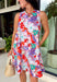This pink floral midi dress is made for standing out in the best way this summer! Featuring a bold mix of tomato red, blue, green, purple, and white, it’s bright, fun, and full of personality. The sleeveless design keeps it cool and easy, while the tie detail at the back adds a subtle, feminine touch. Fully lined with side pockets (always a win), it’s as practical as it is eye-catching. Perfect for everything from brunch to vacation dinners, this is the kind of dress that does all the work for you. 