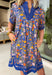 This royal blue floral dress is basically a walking burst of spring happiness! The colorful print is full of bright orange, pink, and green blooms that pop beautifully against the bold blue background, and the scalloped embroidered trim down the front adds the sweetest little detail that makes it feel extra special. Fully lined for easy wear and finished with side pockets.