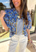 Sweet, colorful, and full of spring charm, this blue short sleeve top by Voy is a total standout. Featuring a soft floral print in shades of blue, sage, and mustard, it brings the prettiest pop of color to your everyday look. Blue and white striped detailing down the front (and a matching stripe accent on the back!) adds a fun contrast, while mustard ricrack trim gives it the cutest vintage-inspired touch. Finished with elastic puff sleeves for a feminine silhouette, this top is an easy way to dress up your