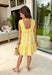 Soft, sunny, and full of charm! This butter yellow sleeveless dress features delicate swiss dot texture throughout for a light, airy feel that’s perfect for the season. The cheerful color instantly brightens your look while keeping things soft and feminine. Designed with a flattering v-neckline and subtle textured detailing along the neckline and hem, this dress adds just the right amount of interest while staying easy and timeless. 