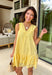 Soft, sunny, and full of charm! This butter yellow sleeveless dress features delicate swiss dot texture throughout for a light, airy feel that’s perfect for the season. The cheerful color instantly brightens your look while keeping things soft and feminine. Designed with a flattering v-neckline and subtle textured detailing along the neckline and hem, this dress adds just the right amount of interest while staying easy and timeless. 