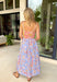 This mixed print floral midi dress is such a fun, standout piece for summer! With its patchwork-inspired design and contrast trim, it brings a unique, eye-catching look that still feels easy to wear. The button down front adds a classic touch, while the smocked back keeps the fit comfortable and flattering. Fully lined with side pockets (always a win), it’s perfect for everything from brunch to vacation days. Lightweight and breathable, this is one of those dresses that does all the styling for you. 