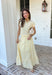 This yellow and white stripe two piece set is bringing all the sunshine to your warm weather wardrobe! The short sleeve top features cuffed sleeves and a subtle keyhole closure for a polished touch, while the matching tiered midi skirt with an elastic waistband keeps things comfortable and flattering. Made from breathable 100% cotton, this set is perfect for warm days filled with brunch plans, baby showers, or weekend outings. 