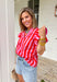 This pink and red striped flutter sleeve top is bringing all the bright, happy summer energy! The bold stripe combo feels fun and fresh, while the flutter sleeves add that soft, feminine touch that’s easy to dress up or down. The stripe trim along the v-neck gives it a unique, elevated detail that makes this one stand out from your everyday tops. Lightweight and breathable in 100% cotton, it’s perfect for warm days when you still want to feel put together.