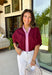 Rich fall colors and timeless details make this burgundy top an instant wardrobe favorite! The deep burgundy hue is beautifully accented with a pink trim along the neckline and front, creating a subtle pop of color that feels both feminine and sophisticated. The elastic puff sleeves add just the right amount of volume, giving this top an elevated look that's perfect for workdays, dinner dates, or weekend outings. Comfortable and easy to style, it's the kind of piece you'll reach for all season long.
