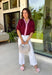 Rich fall colors and timeless details make this burgundy top an instant wardrobe favorite! The deep burgundy hue is beautifully accented with a pink trim along the neckline and front, creating a subtle pop of color that feels both feminine and sophisticated. The elastic puff sleeves add just the right amount of volume, giving this top an elevated look that's perfect for workdays, dinner dates, or weekend outings. Comfortable and easy to style, it's the kind of piece you'll reach for all season long.