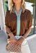 Rich fall colors and timeless details make this brown top an instant wardrobe favorite! The rich brown hue is beautifully accented with a blue trim along the neckline and front, creating a subtle pop of color that feels both feminine and sophisticated. The elastic puff sleeves add just the right amount of volume, giving this top an elevated look that's perfect for workdays, dinner dates, or weekend outings. Comfortable and easy to style, it's the kind of piece you'll reach for all season long. 