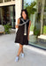 The layered look has never been easier! This black knit mini dress features an attached black and white striped sweater scarf detail, giving you the cozy, elevated style of layered fall fashion in one effortless piece. Crafted from a soft, comfortable knit, it's perfect for crisp autumn days when you want to look polished without sacrificing comfort. From brunch dates and shopping trips to dinner with friends, this chic dress is ready for every fall occasion.
