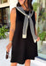 The layered look has never been easier! This black knit mini dress features an attached black and white striped sweater scarf detail, giving you the cozy, elevated style of layered fall fashion in one effortless piece. Crafted from a soft, comfortable knit, it's perfect for crisp autumn days when you want to look polished without sacrificing comfort. From brunch dates and shopping trips to dinner with friends, this chic dress is ready for every fall occasion.