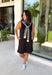 The layered look has never been easier! This black knit mini dress features an attached black and white striped sweater scarf detail, giving you the cozy, elevated style of layered fall fashion in one effortless piece. Crafted from a soft, comfortable knit, it's perfect for crisp autumn days when you want to look polished without sacrificing comfort. From brunch dates and shopping trips to dinner with friends, this chic dress is ready for every fall occasion.