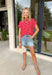 Nothing says “easy spring outfit” like a classic red-and-white stripe moment! This short sleeve top is one of those throw-on-and-go pieces that instantly looks cute without even trying. The bright red base feels fun and fresh for the season, while the crisp white stripes keep it timeless. Finished with elastic sleeve cuffs for a soft, slightly puffed shape, it’s comfy enough for all-day wear and polished enough to dress up with your favorite denim and accessories.