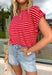 Nothing says “easy spring outfit” like a classic red-and-white stripe moment! This short sleeve top is one of those throw-on-and-go pieces that instantly looks cute without even trying. The bright red base feels fun and fresh for the season, while the crisp white stripes keep it timeless. Finished with elastic sleeve cuffs for a soft, slightly puffed shape, it’s comfy enough for all-day wear and polished enough to dress up with your favorite denim and accessories.