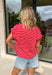 Nothing says “easy spring outfit” like a classic red-and-white stripe moment! This short sleeve top is one of those throw-on-and-go pieces that instantly looks cute without even trying. The bright red base feels fun and fresh for the season, while the crisp white stripes keep it timeless. Finished with elastic sleeve cuffs for a soft, slightly puffed shape, it’s comfy enough for all-day wear and polished enough to dress up with your favorite denim and accessories.