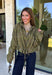 Give your everyday layers a western-inspired twist with this olive bandana jacket from Entro. The rich olive color paired with the bandana-inspired print gives it a vintage feel that's fun without being hard to style. A zipper-front closure keeps the look casual and easy to throw on, while convenient side pockets add an everyday touch you'll appreciate. Made from 100% cotton, it's a great lightweight layer to keep nearby for crisp mornings, weekend errands, and casual nights out. 