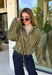 Give your everyday layers a western-inspired twist with this olive bandana jacket from Entro. The rich olive color paired with the bandana-inspired print gives it a vintage feel that's fun without being hard to style. A zipper-front closure keeps the look casual and easy to throw on, while convenient side pockets add an everyday touch you'll appreciate. Made from 100% cotton, it's a great lightweight layer to keep nearby for crisp mornings, weekend errands, and casual nights out. 