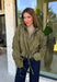 Give your everyday layers a western-inspired twist with this olive bandana jacket from Entro. The rich olive color paired with the bandana-inspired print gives it a vintage feel that's fun without being hard to style. A zipper-front closure keeps the look casual and easy to throw on, while convenient side pockets add an everyday touch you'll appreciate. Made from 100% cotton, it's a great lightweight layer to keep nearby for crisp mornings, weekend errands, and casual nights out. 