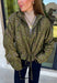 Give your everyday layers a western-inspired twist with this olive bandana jacket from Entro. The rich olive color paired with the bandana-inspired print gives it a vintage feel that's fun without being hard to style. A zipper-front closure keeps the look casual and easy to throw on, while convenient side pockets add an everyday touch you'll appreciate. Made from 100% cotton, it's a great lightweight layer to keep nearby for crisp mornings, weekend errands, and casual nights out. 