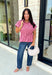Classic stripes get a flattering update with this effortlessly stylish top that's perfect for the season! Designed in a rich marsala hue with timeless stripe detailing, this lightweight blouse is easy to dress up or down for wherever your day takes you. The adjustable drawstring waist and gathered back create a figure-flattering silhouette, while the button-front design adds a polished finish. 