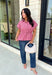 Classic stripes get a flattering update with this effortlessly stylish top that's perfect for the season! Designed in a rich marsala hue with timeless stripe detailing, this lightweight blouse is easy to dress up or down for wherever your day takes you. The adjustable drawstring waist and gathered back create a figure-flattering silhouette, while the button-front design adds a polished finish. 