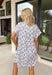 This off white button down dress by Umgee is such a fresh, easy pick for spring days! The abstract blue print gives it a fun pop of color while still feeling classic and easy to wear. With a collared neckline and button-down front, it has that effortless shirt dress vibe that always looks polished—whether you’re heading to brunch, running errands, or dressing up for a casual event.