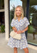 This off white button down dress by Umgee is such a fresh, easy pick for spring days! The abstract blue print gives it a fun pop of color while still feeling classic and easy to wear. With a collared neckline and button-down front, it has that effortless shirt dress vibe that always looks polished—whether you’re heading to brunch, running errands, or dressing up for a casual event.