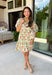This neutral floral dress is such a fresh and fun pick for summer! With pops of green, pink, red, yellow, and orange, it brings just the right amount of color while still feeling easy to wear for everyday plans. The green and white trim on the sleeves adds a playful contrast, and the subtle ruffle neckline gives it a soft, feminine touch. Lightweight, fully lined, and finished with side pockets (always a win), it’s perfect for everything from brunch to weekend outings. 