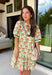 This neutral floral dress is such a fresh and fun pick for summer! With pops of green, pink, red, yellow, and orange, it brings just the right amount of color while still feeling easy to wear for everyday plans. The green and white trim on the sleeves adds a playful contrast, and the subtle ruffle neckline gives it a soft, feminine touch. Lightweight, fully lined, and finished with side pockets (always a win), it’s perfect for everything from brunch to weekend outings. 