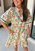 This neutral floral dress is such a fresh and fun pick for summer! With pops of green, pink, red, yellow, and orange, it brings just the right amount of color while still feeling easy to wear for everyday plans. The green and white trim on the sleeves adds a playful contrast, and the subtle ruffle neckline gives it a soft, feminine touch. Lightweight, fully lined, and finished with side pockets (always a win), it’s perfect for everything from brunch to weekend outings. 