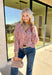 This cozy knit cardigan by Mystree brings warmth and color to your fall wardrobe. Designed in shades of pink, purple, light blue, and cream, it’s finished with a button-down front that makes it easy to style open or closed. Soft with a touch of wool, this piece has that perfect blend of comfort and charm—ideal for layering on crisp days.