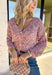 This cozy knit cardigan by Mystree brings warmth and color to your fall wardrobe. Designed in shades of pink, purple, light blue, and cream, it’s finished with a button-down front that makes it easy to style open or closed. Soft with a touch of wool, this piece has that perfect blend of comfort and charm—ideal for layering on crisp days.