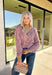 This cozy knit cardigan by Mystree brings warmth and color to your fall wardrobe. Designed in shades of pink, purple, light blue, and cream, it’s finished with a button-down front that makes it easy to style open or closed. Soft with a touch of wool, this piece has that perfect blend of comfort and charm—ideal for layering on crisp days.