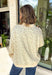 Cute, cozy, and full of Texas charm! This cream mock neck pullover features a dainty pink floral print with “TEXAS” across the front in white outlined in pink for the sweetest statement. It’s the perfect mix of feminine and hometown pride. The soft fabric and relaxed fit make it easy to wear all day, whether you’re running errands, heading to a game, or just keeping things comfy. The mock neck adds a slightly elevated touch while still feeling laid-back and cozy.