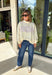 Cute, cozy, and full of Texas charm! This cream mock neck pullover features a dainty pink floral print with “TEXAS” across the front in white outlined in pink for the sweetest statement. It’s the perfect mix of feminine and hometown pride. The soft fabric and relaxed fit make it easy to wear all day, whether you’re running errands, heading to a game, or just keeping things comfy. The mock neck adds a slightly elevated touch while still feeling laid-back and cozy.