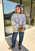 Show a little Lone Star love while staying extra cozy in this heather grey “Texas” pullover from Bucket List. The bold lettering features a crimson and white stripe print, with each letter outlined in white embroidery for added texture and a standout finish. A mock neckline and long sleeves give it a cozy cold-weather feel, while the fleece-lined interior makes it perfect for crisp fall mornings and chilly weekends. 