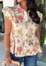 Fresh florals meet cozy fall style in this charming peplum blouse. Featuring a soft neutral backdrop with delicate pops of pink and green, this top brings just the right amount of color to your autumn wardrobe. The collared neckline and button front add a timeless, polished touch, while the peplum hem creates a flattering silhouette you'll love. Elastic puff sleeves complete the look with feminine charm, making this top perfect for everything from workdays to weekend brunches.