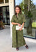 Embrace effortless fall style with this beautifully detailed midi dress from Entro. Designed in a rich olive hue with a vintage-inspired paisley print in shades of brown and off-white, this timeless dress brings the perfect blend of western charm and boho flair. The flattering midi silhouette is easy to dress up or down, while convenient side pockets add an everyday touch you'll love. 