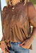 Elevate your fall wardrobe with this stunning faux leather top that perfectly blends edgy style with feminine charm. Designed in a rich chocolate brown, this statement piece features beautiful lace detailing along the front that softens the sleek faux leather finish for a look that's effortlessly sophisticated. The textured fabric adds depth and dimension, while the classic short sleeve silhouette makes it easy to style from season to season. 