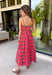 Bring warm seasonal charm to your wardrobe with this beautifully crafted plaid midi dress. Featuring a lovely coral and brown plaid print, this timeless style is designed with a flattering straight neckline and a flowing midi silhouette that's perfect for every fall occasion. Adjustable shoulder straps and a smocked back provide a comfortable, customizable fit, while the fully lined design offers effortless wear from day to night. 