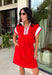 This red short sleeve dress is the perfect mix of sporty and cute for summer! Designed with a quarter zip neckline and elastic self-tie waist, it gives you that flattering, adjustable fit while keeping things comfortable for all-day wear. The red, pink, and white athletic stripe detail along the front, neckline, and cuffs adds a fun, energetic touch that makes this one stand out. Finished with side pockets (always a win), it’s perfect for everything from errands to casual plans.