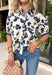 This off white floral top is the perfect transition piece for fall days! The navy floral print with subtle hints of green brings in those rich, seasonal tones while still feeling light and easy to wear. The collared neckline and button down front give it a polished feel, while the navy and white stripe detail along the front and sleeves adds a fun, unexpected touch. Made from breathable cotton, it’s perfect for layering now and wearing into cooler days.