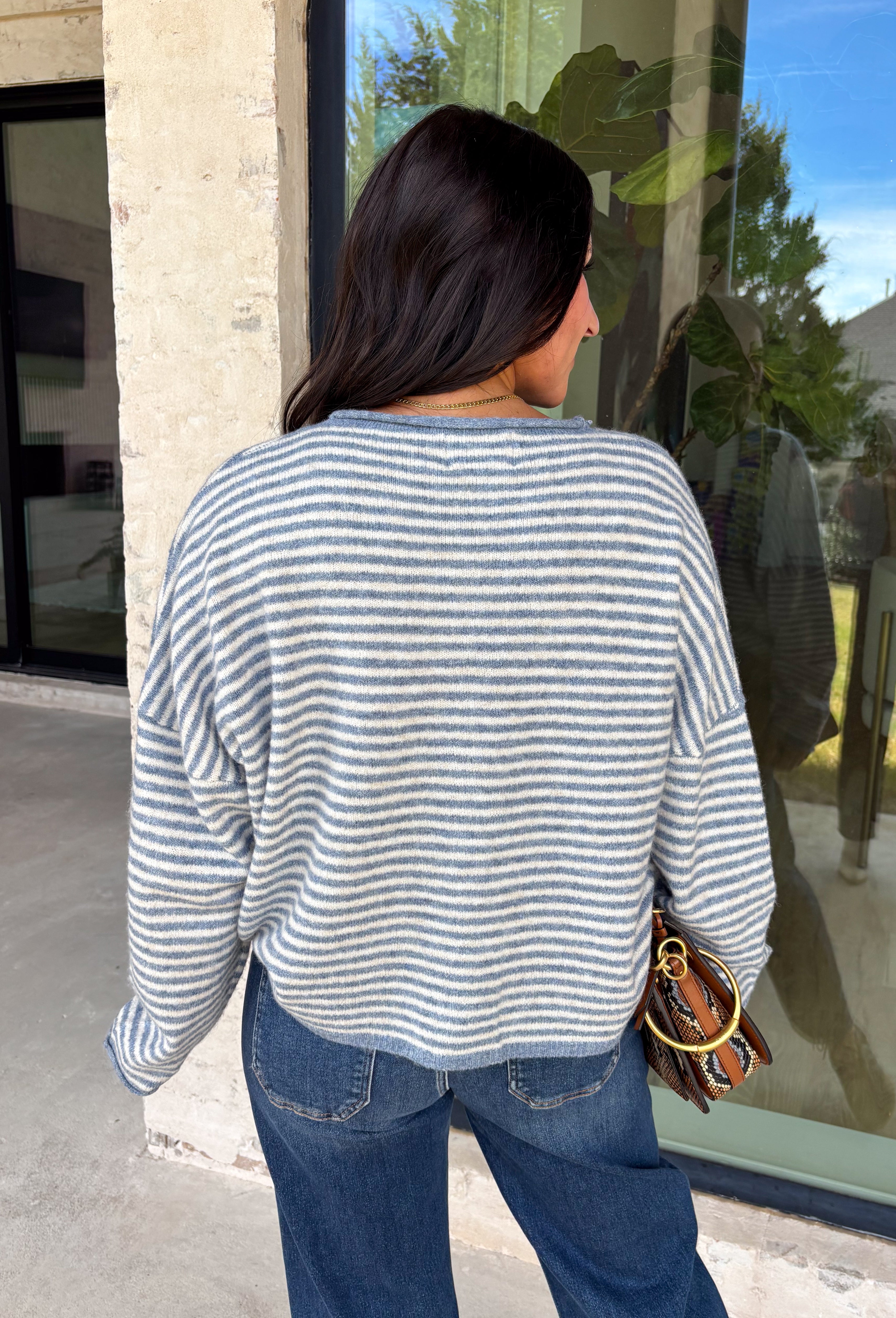 Stay cozy in timeless style with this dusty blue and off white striped cardigan! Made from an ultra-soft knit, this button-down layer is perfect for tossing on over your favorite basics when the temperatures start to cool. Whether you're heading to the office, enjoying a weekend coffee run, or relaxing at home, this cardigan is an effortless staple you'll reach for again and again.