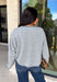 Stay cozy in timeless style with this dusty blue and off white striped cardigan! Made from an ultra-soft knit, this button-down layer is perfect for tossing on over your favorite basics when the temperatures start to cool. Whether you're heading to the office, enjoying a weekend coffee run, or relaxing at home, this cardigan is an effortless staple you'll reach for again and again.