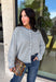 Stay cozy in timeless style with this dusty blue and off white striped cardigan! Made from an ultra-soft knit, this button-down layer is perfect for tossing on over your favorite basics when the temperatures start to cool. Whether you're heading to the office, enjoying a weekend coffee run, or relaxing at home, this cardigan is an effortless staple you'll reach for again and again.