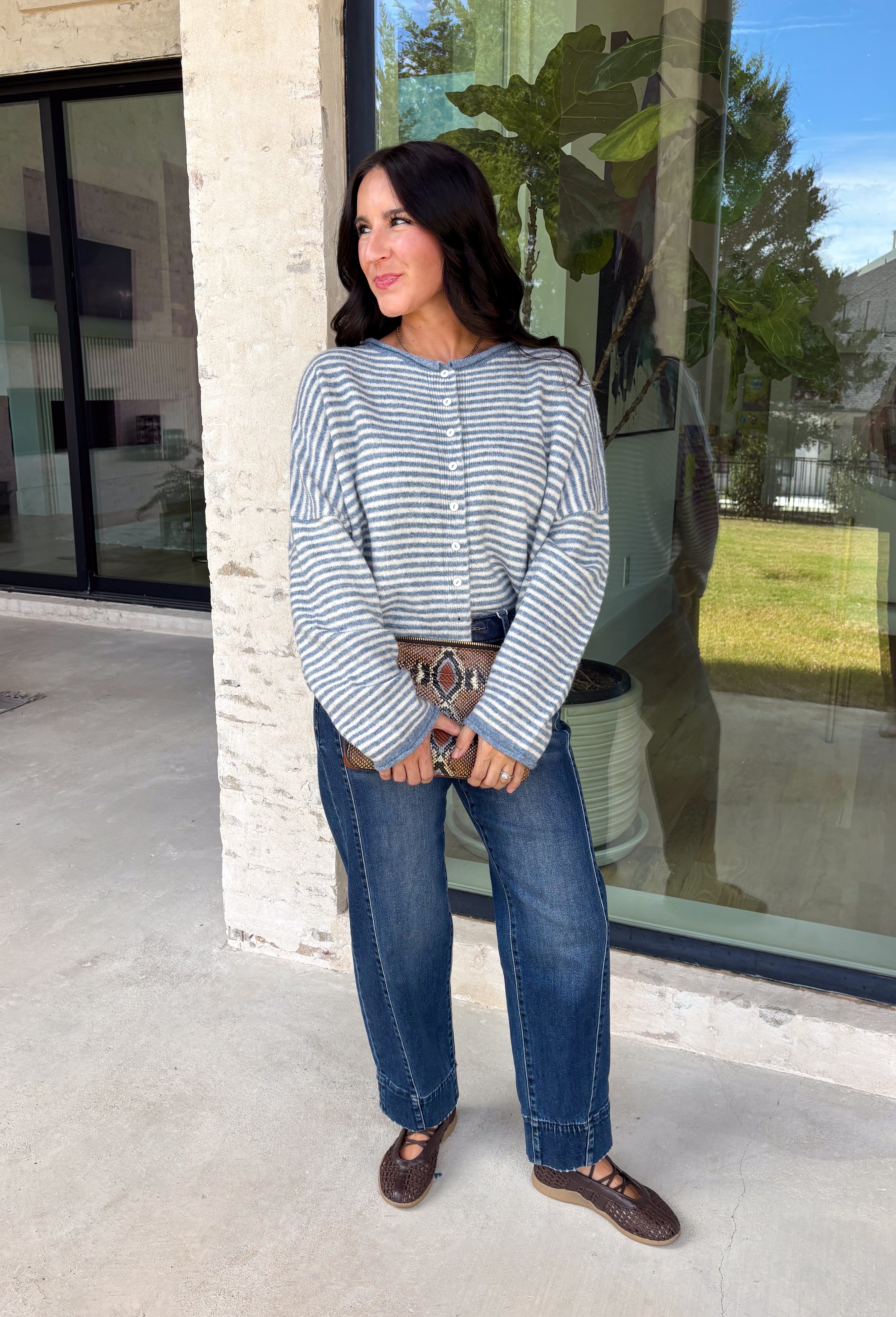 Stay cozy in timeless style with this dusty blue and off white striped cardigan! Made from an ultra-soft knit, this button-down layer is perfect for tossing on over your favorite basics when the temperatures start to cool. Whether you're heading to the office, enjoying a weekend coffee run, or relaxing at home, this cardigan is an effortless staple you'll reach for again and again.