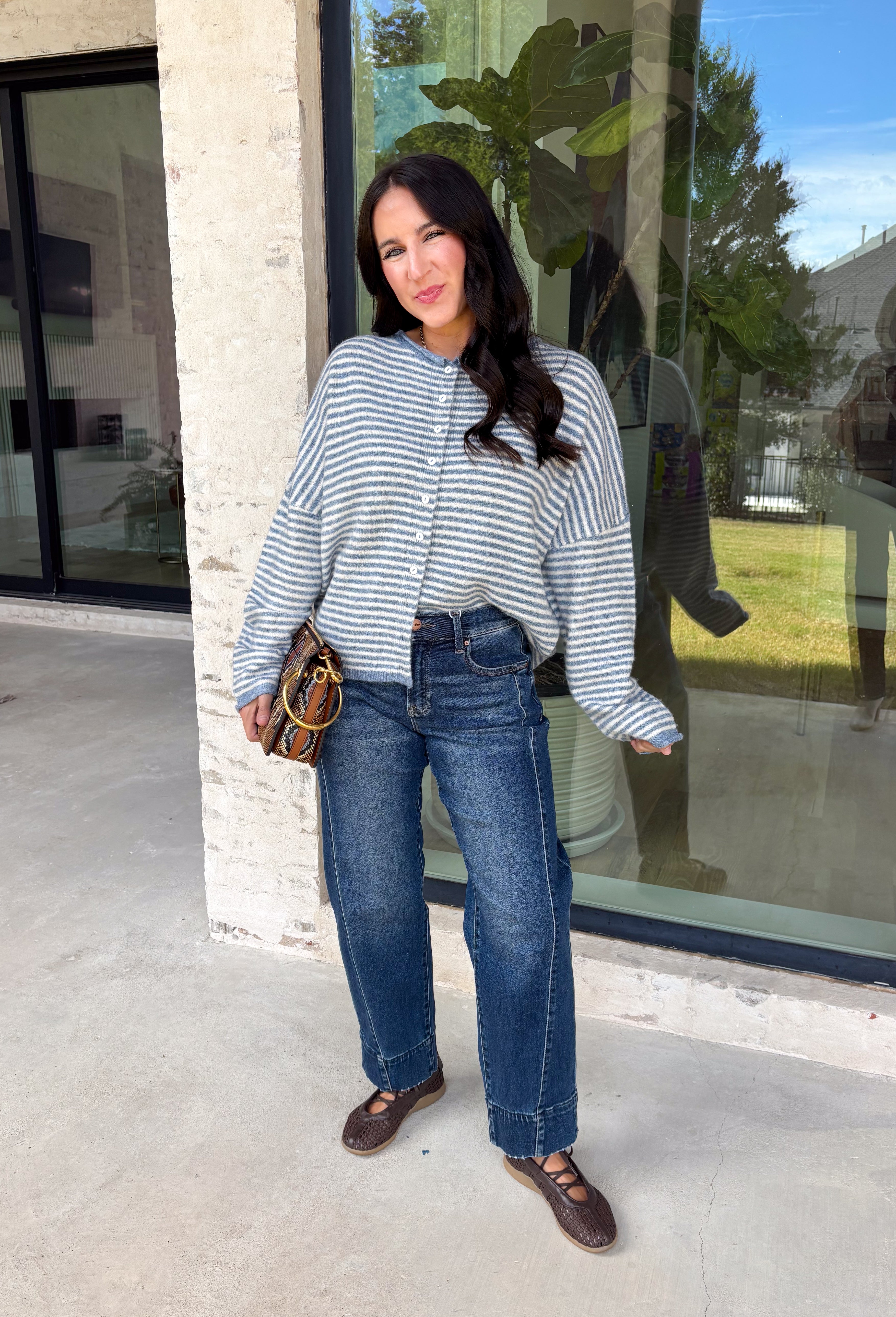 Stay cozy in timeless style with this dusty blue and off white striped cardigan! Made from an ultra-soft knit, this button-down layer is perfect for tossing on over your favorite basics when the temperatures start to cool. Whether you're heading to the office, enjoying a weekend coffee run, or relaxing at home, this cardigan is an effortless staple you'll reach for again and again.