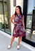 Rich fall colors and beautiful embroidered details make this dress an instant seasonal favorite! Crafted in a gorgeous wine hue, this sleeveless dress features delicate light blue and off white floral embroidery that creates a charming, handcrafted look. The button front and self-tie waist belt with playful contrast pom trim create a flattering silhouette, while side pockets and a fully lined design make it as practical as it is beautiful. 